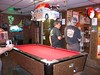 SNC1923 > Hank (who put this ride together) and Steve chatting in the bar, surrounded by a gazillion pennies.